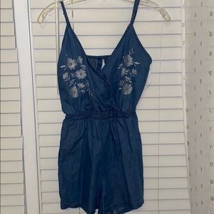 Floral denim romper with cutout on back